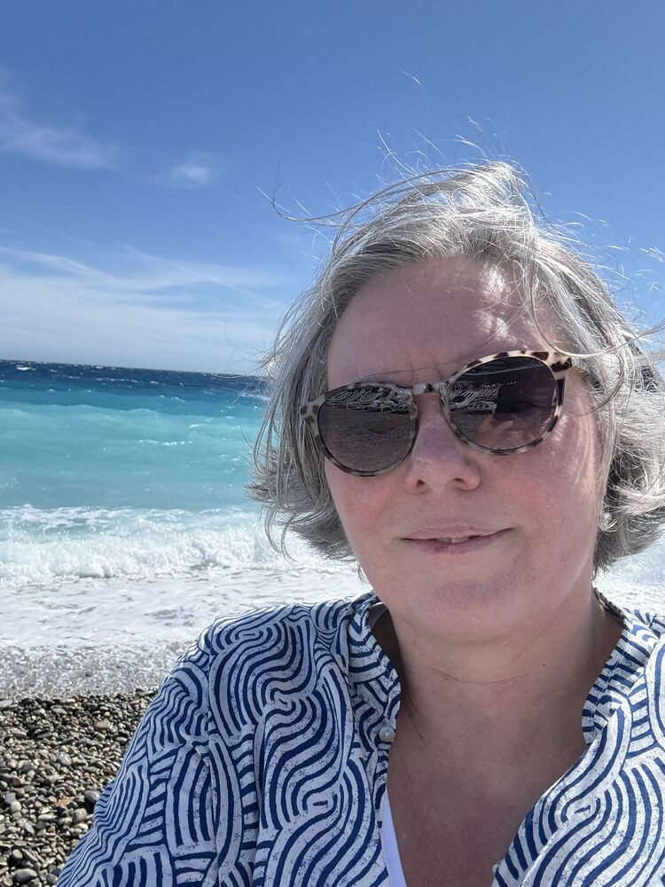 Carolyn Pini, the artist behind Colorpini, by the sea